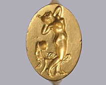 gold ring with naked dancing girl