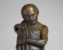 bronze statuette of an ancient Greek workman