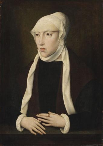 Mature woman in a plain dress and head covering