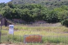 overgrown ruins of an open hillside theater