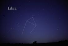 Photo of the night sky with the constellation Libra outlined