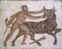 Hercules (left) grasps the Cretan Bull (right) by its right horn and muzzle turning its head to face the viewer. Hercules wears his lion skin; his club lies discarded on the ground below the bull.
