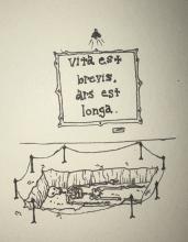 A rectangular pit has been excavated in which lies a skeleton. It is roped off with stanchions. Behind the excavated area a lamp hangs above a placard which reads “Vita est brevis. Ars est longa."