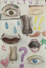 Colored pencil drawing of facial features. Top left corner: a brown eye behind rectangular glasses, black eyebrow, and dark skin; below it, 3 tear drops. Top right: light-skinned closed eye with a brown eyebrow. Middle of page: a pair of dark brown lips, curved in a slight smile. Right and slightly above, a dark brown nose and two yellow exclamation points; below them is a red mustache. Bottom left an unknown v-shaped red object; next to it a tan nose. Far right an open mouth with red lips; below a blue eye